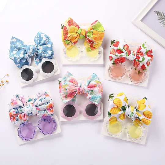 Trendy bow and sunglasses combo